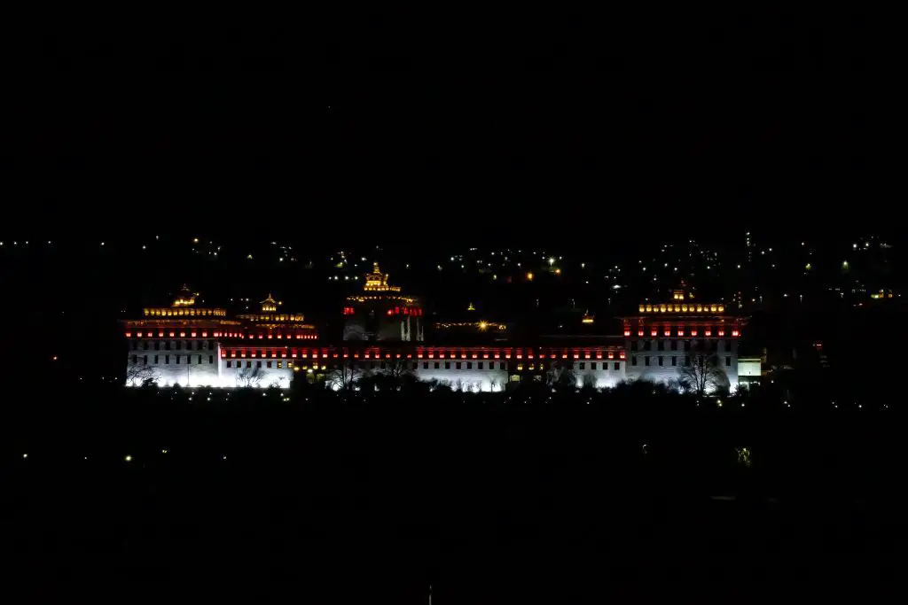 The night view of Thimphu Tashichho Dzong. It has been the seat of the government since 1952 and presently houses the throne room and offices of the king, the secretariat and the ministries of home affairs and finance. 