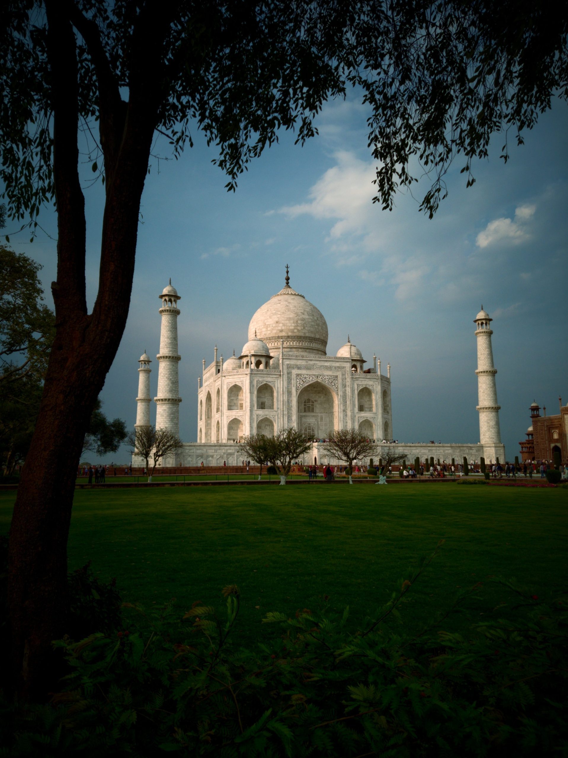 white concrete building under blue sky during daytime taj mahal tickets