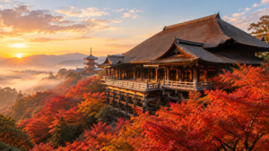 Kiyomizu-dera wooden temple stage overlooking autumn maple foliage during early morning in Kyoto.