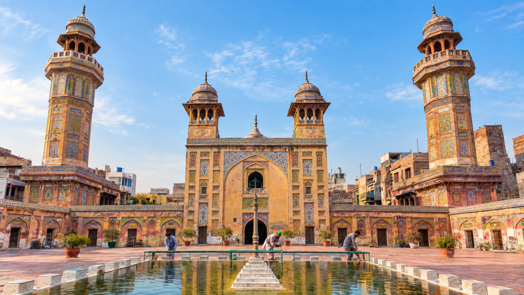 Colorful glazed tile mosaics and ornate frescoes decorating Wazir Khan Mosque in Old Lahore.
